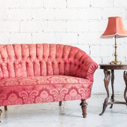 Red sofa couch in vintage room with lamp - classical style